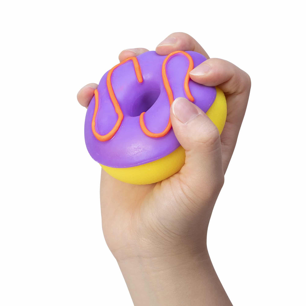 NeeDoh Dohnuts X1 Yellow with Purple Frosting and Orange Icing in Hand