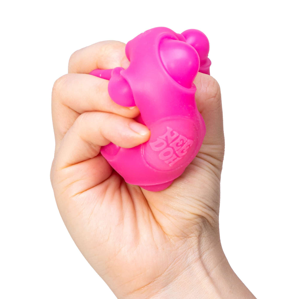 NeeDoh Happy Snappy J6 - Hand squeezing pink Happy Snappy J6