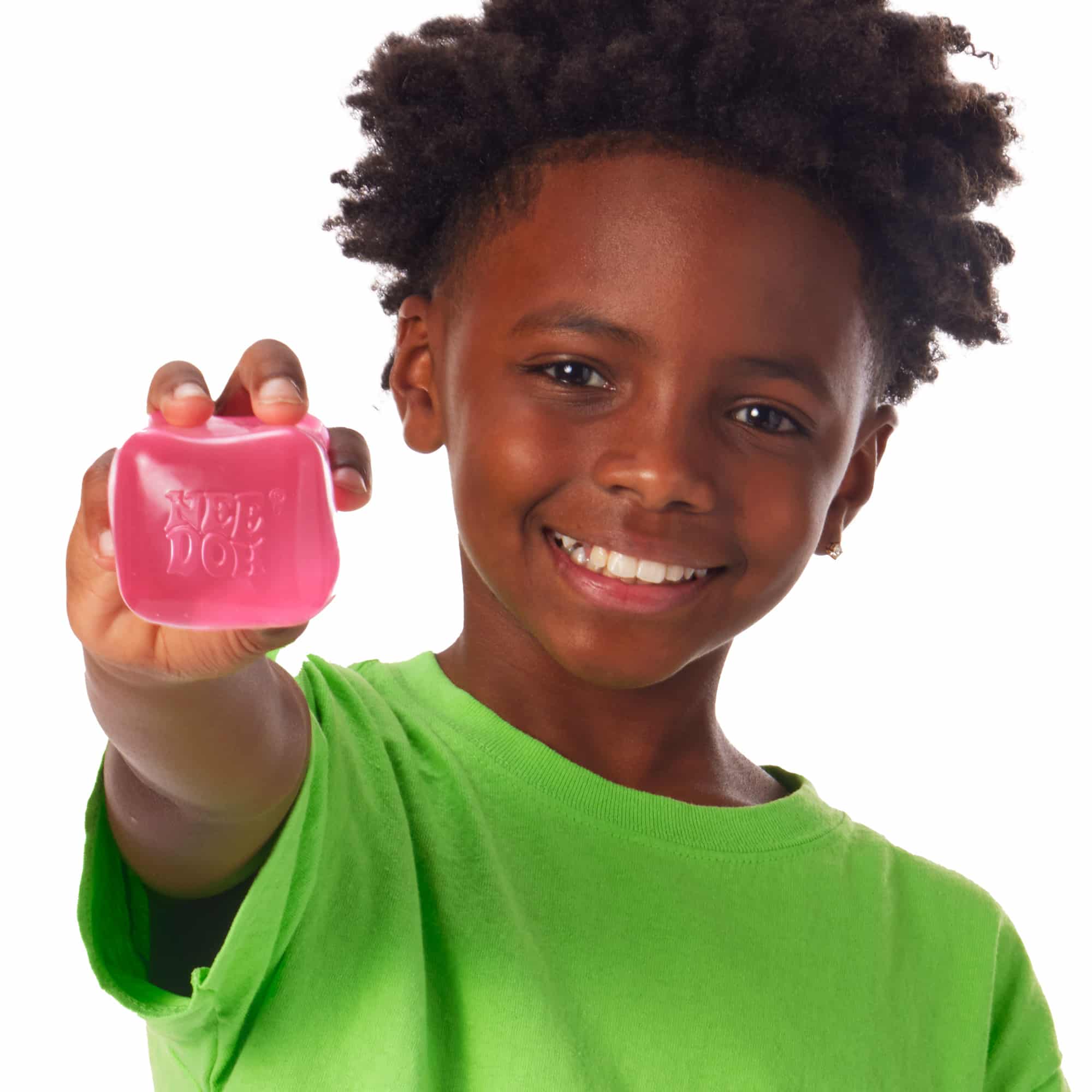 NeeDoh Nice Cube L8 Lifestyle of boy squeezing pink Nice Cube L8