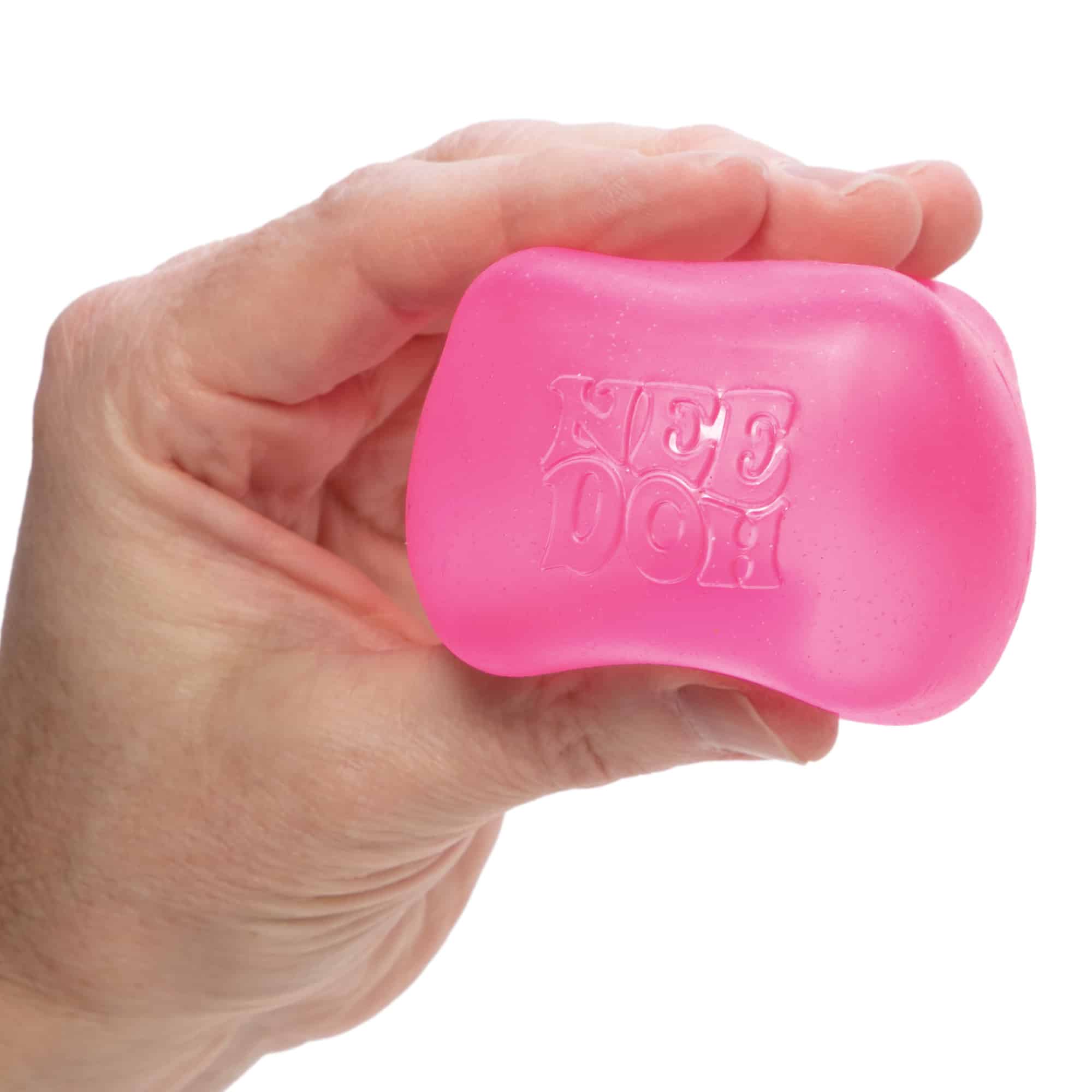 NeeDoh Nice Cube L8 Pink Held in Hand