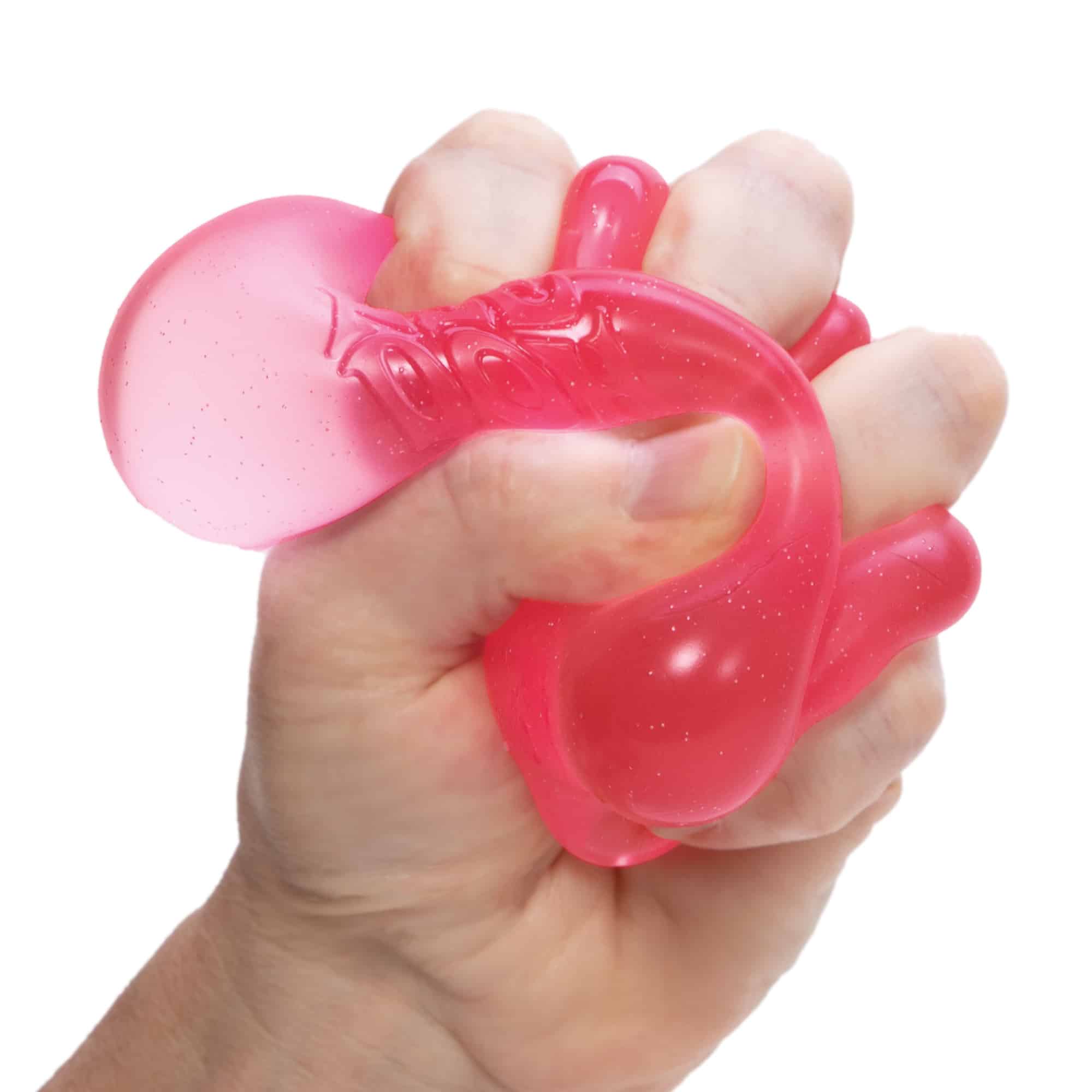 NeeDoh Nice Cube L8 Pink Squeezed in Hand