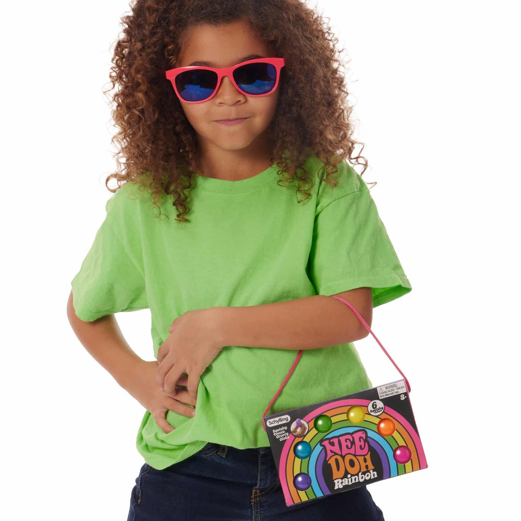 Girl wearing neon sunglasses with NeeDoh Rainboh F8 package hanging off her arm
